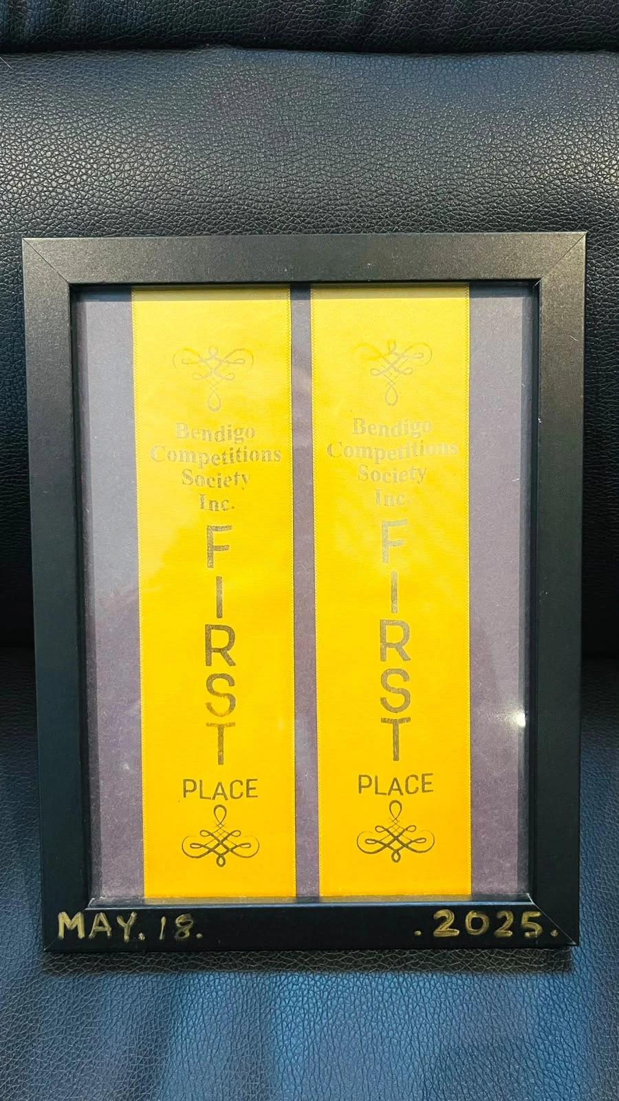 Isaac with Bendigo first-place ribbons